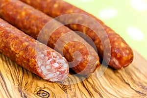 Mixed meat-red sausage on the cutting board