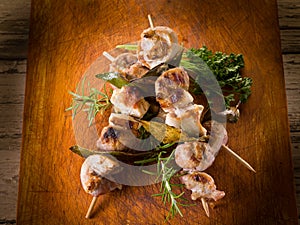 Mixed meat skewer on wooden