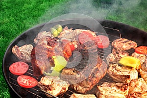 Mixed Meat And Vegetables On The Hot BBQ Grill