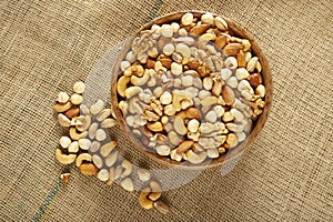 Mixed nuts in a bamboo plate