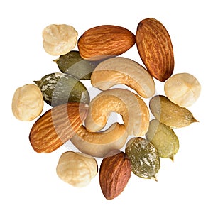 Mixed nuts and seeds isolated on white background, close up.