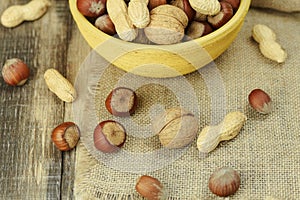 Mixed nuts in shell in a bowl, close-up