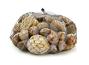 Mixed nuts - walnuts, hazelnuts, almonds in a net bag