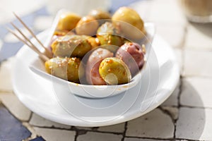 Mixed olives in bowl, appetiser photo