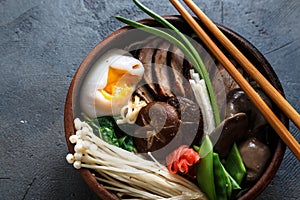 Mixed oriental mushroom stir fry with noodles soup and spring onion