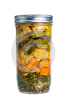 Mixed pickled vegetables in mason jars
