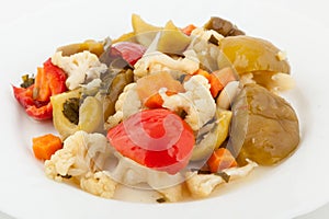 Mixed pickled vegetables in white plate