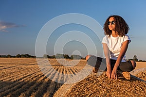 Mixed Race African American Girl Teen Sunglasses Sitting on Hay