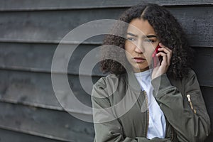 Mixed Race African American Girl Teenager on Cell Phone