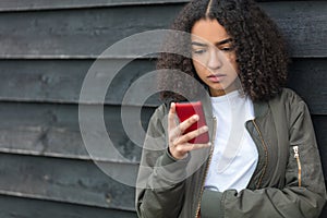 Mixed Race African American Girl Teenager on Cell Phone