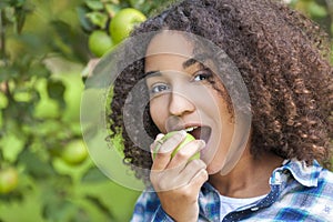 Mixed Race African American Girl Teenager Eating Apple