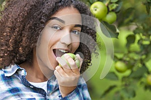 Mixed Race African American Girl Teenager Eating Apple