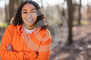 Mixed Race African American Girl Teenager Smiling Laughing in Evening Sunshine