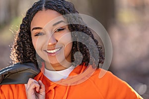 Mixed Race African American Girl Teenager Smiling Laughing in Evening Sunshine