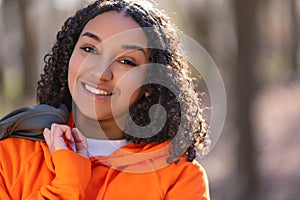 Mixed Race African American Girl Teenager Smiling Laughing in Evening Sunshine