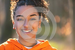 Mixed Race African American Girl Teenager Smiling WIth Perfect Teeth