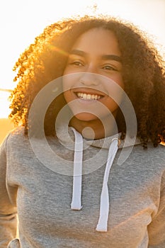 Mixed Race African American Girl Teenager Smiling at Sunset