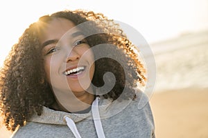 Mixed Race African American Girl Teenager Smiling Sunset Beach