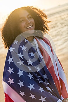 Mixed Race African American Girl Teenager Wrapped in USA Flag