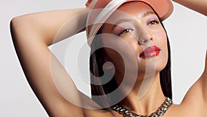 Mixed race asian model in studio beauty shoot