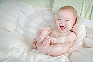 Mixed Race Baby Boy Having Fun on His Blanket