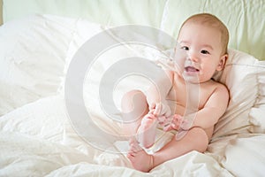 Mixed Race Baby Boy Having Fun on His Blanket