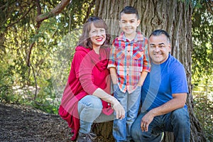 Mixed Race Caucasian and Hispanic Family in the Forest