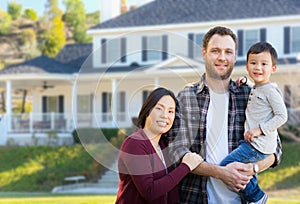 Mixed Race Chinese and Caucasian Parents and Child In Front Yard