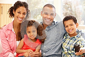 Mixed race family at home photo