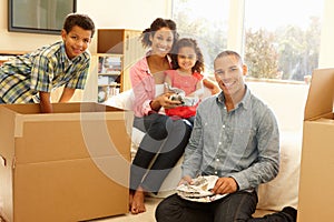 Mixed race family in new home