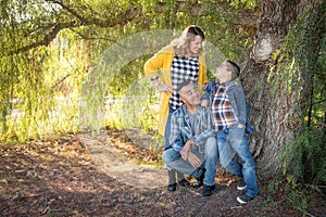 Chatty Mixed Race Family Portrait Outdoors photo
