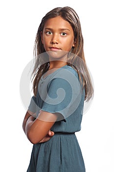 Mixed race girl green eyes with arms folded