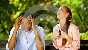 Mixed-race guy shocked by too talkative and annoying girl during first date photo