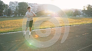 Mixed race man athlete stretching for warming up before running or work out