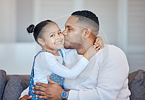 Mixed race man kissing his adorable little daughter on the cheek while bonding together at home. Small girl feeling