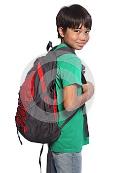 Mixed race oriental school boy with red backpack