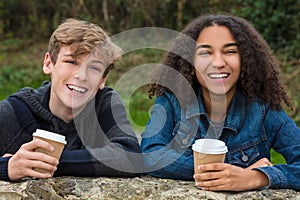 Mixed Race Teenagers Boy & African American Girl Drinking Coffee