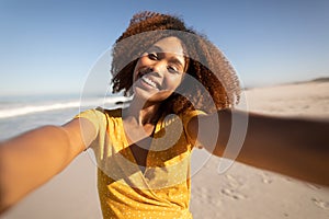 Mixed race woman enjoying her time on the beach
