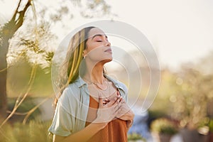 Mixed race woman relax and breathing fresh air outdoor at sunset