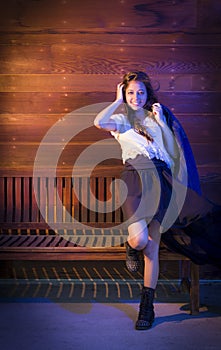 Mixed Race Young Adult Woman Portrait Against Wooden Wall