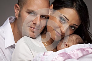 Mixed Race Young Family with Newborn Baby