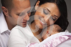 Mixed Race Young Family with Newborn Baby