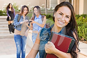 Mixed Race Young Girl Student with School Books On Campus