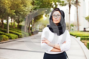 Mixed raced muslim woman on a street of Dubai city