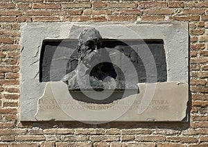 Mixed relief featuring Giacomo Barozzi in a courtyard of the Fortress of Vignola near Modena, Italy.