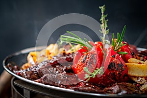 Mixed roast beef steaks set on a plate of tenderloin and Striploin