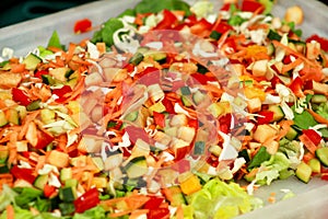 Mixed salad of fruits and vegetables and various flavors.
