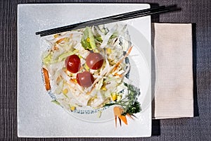 Mixed salad with lettuce, corn, carrots and cherry tomatoes