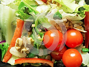 Mixed salad,tomatoes,nuts, ginger