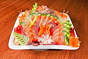 Mixed sashimi in white plate